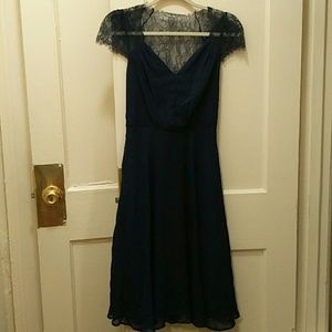 Elegant formal dress with lacy shoulder/back
